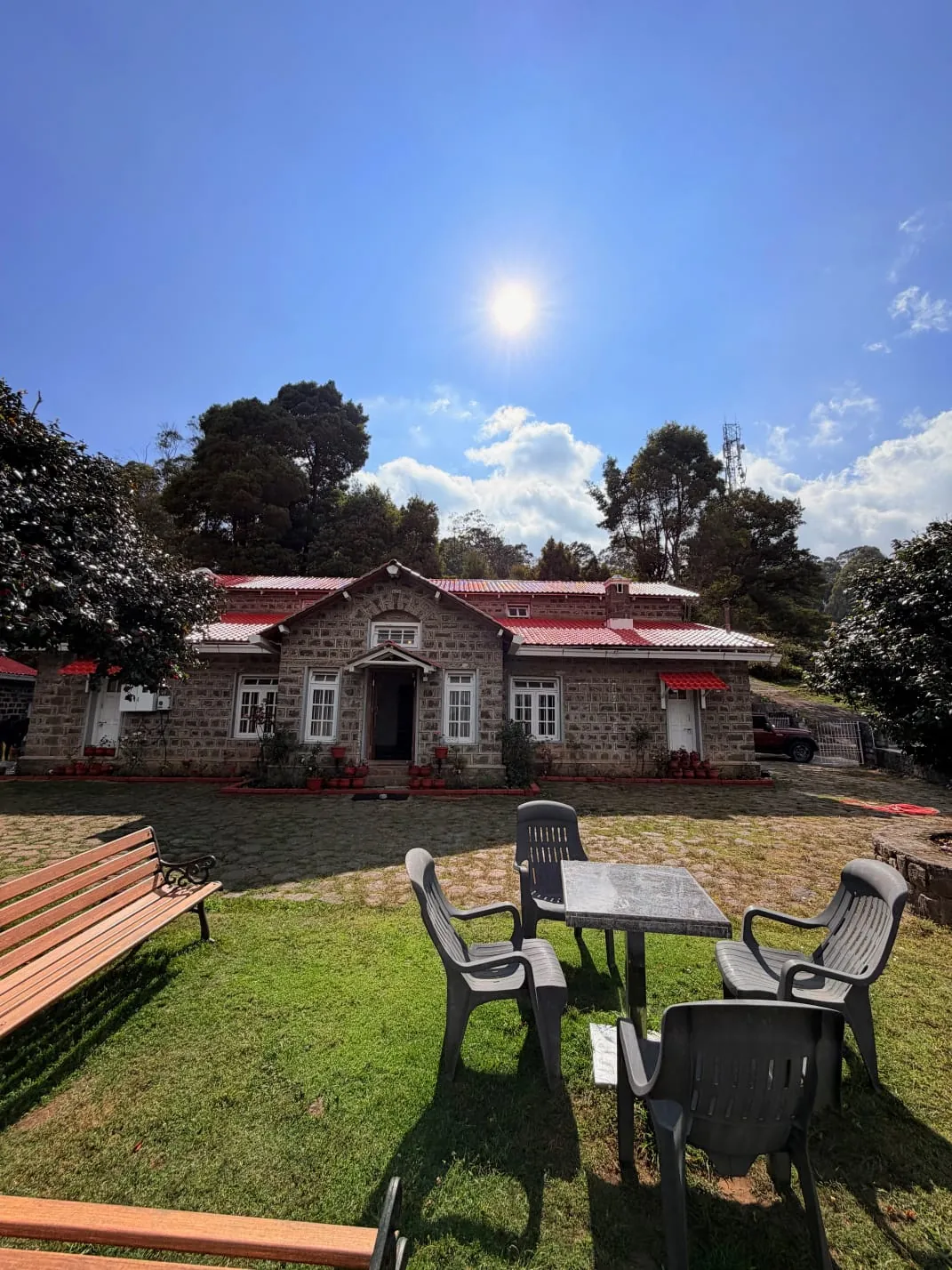 The bungalow seen across its front lawn
